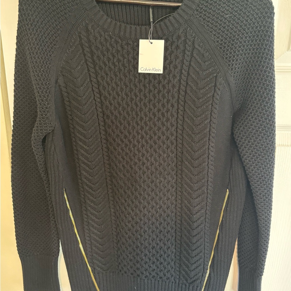 Calvin Klein cable knit sweater. Black with gold-tone side zippers. Medium.